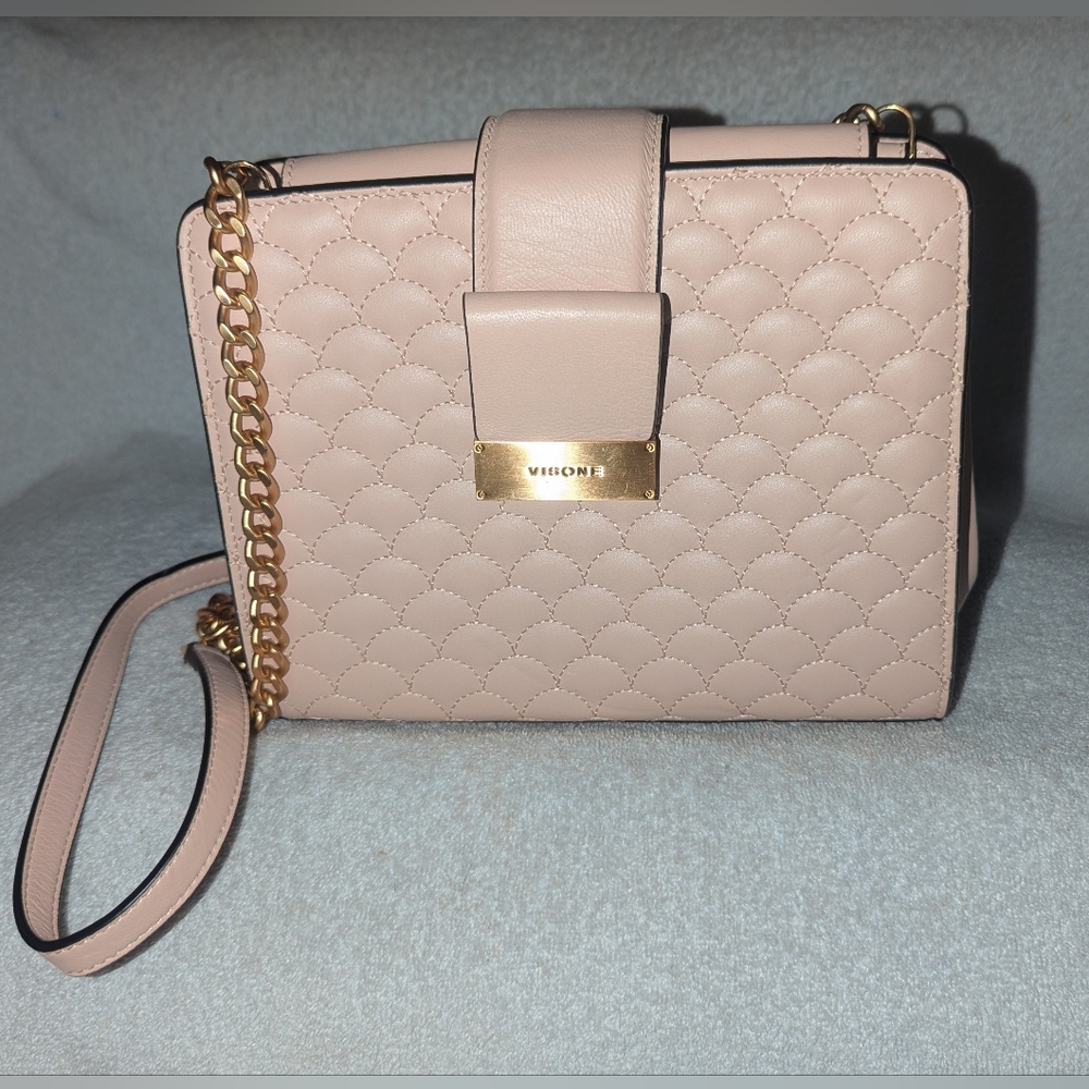 Visone leather chain crossbody bag.